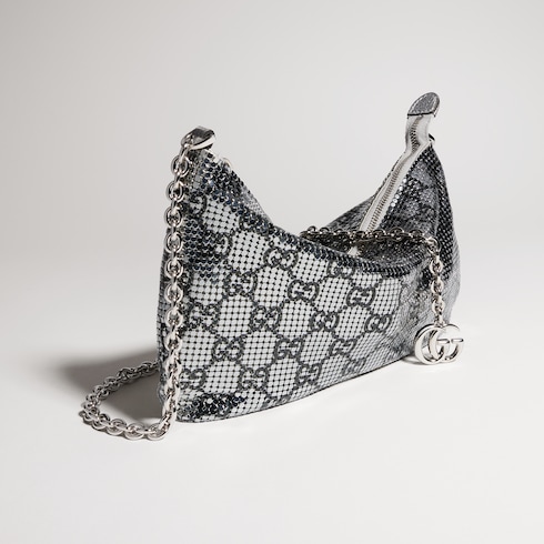 Metallic evening bag with charm