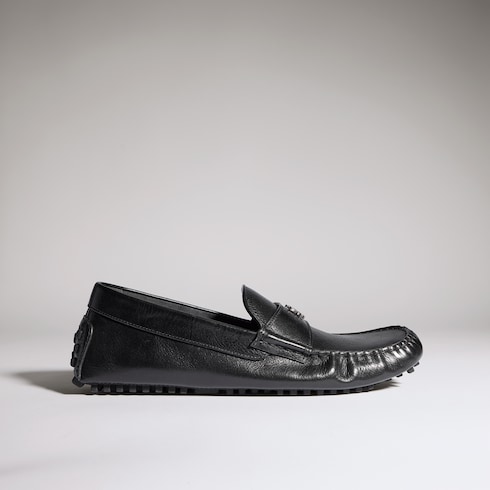 Modello da uomo con stemma Gucci