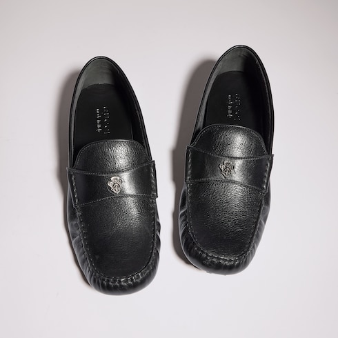 Modello da uomo con stemma Gucci