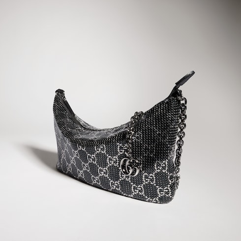 Metallic evening bag with charm