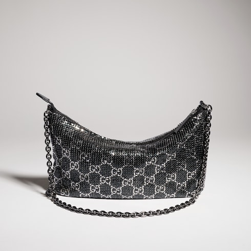 Bolsa de noche metálica con dije