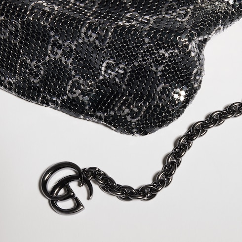 Metallic evening bag with charm