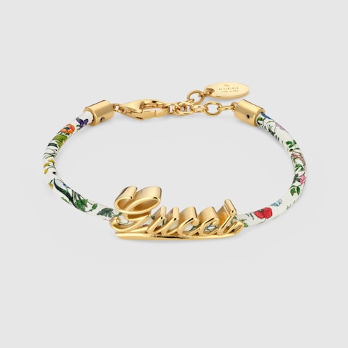 Leather bracelet with Gucci script in white leather | GUCCI® US
