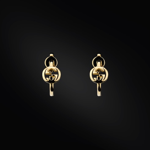 أقراط Gucci Interlocking على شكل حلقة عيار 18 قيراطاً