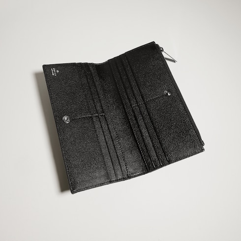 Cartera alargada con placa Gucci