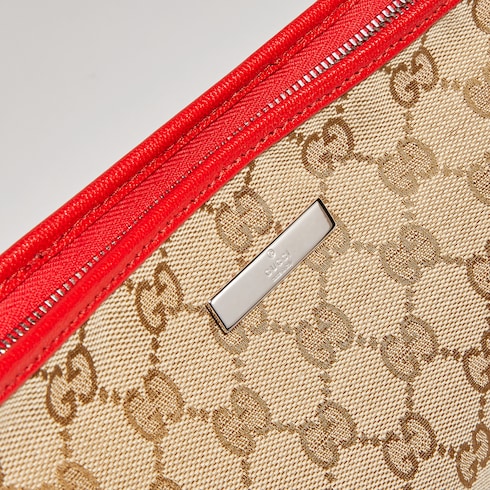 Small pouch with strap and Gucci plaque