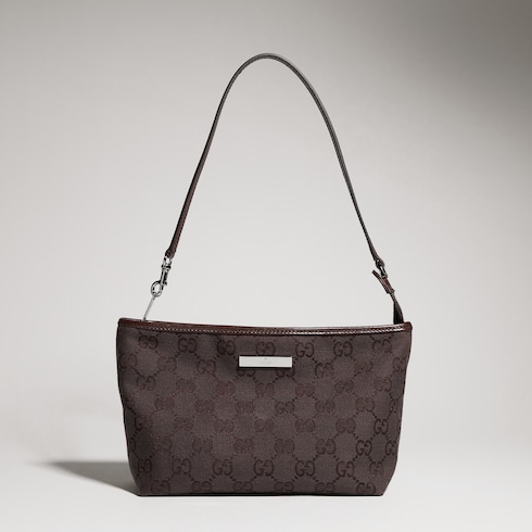 Pouch piccola con cinturino e targhetta Gucci