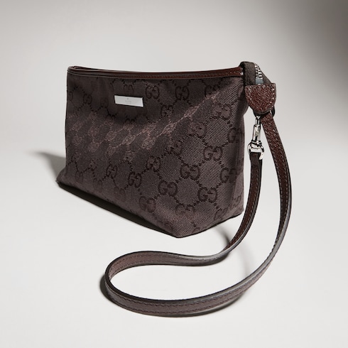 Pouch piccola con cinturino e targhetta Gucci