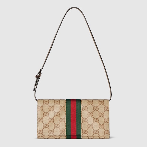 Small pouch with strap and Web in sand and brown GG canvas | GUCCI® US