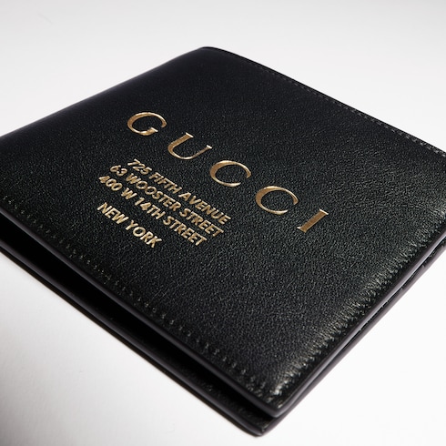 Bi-fold wallet with gold-foiled logo