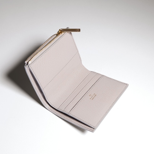 Cartera pequeña con letras Gucci