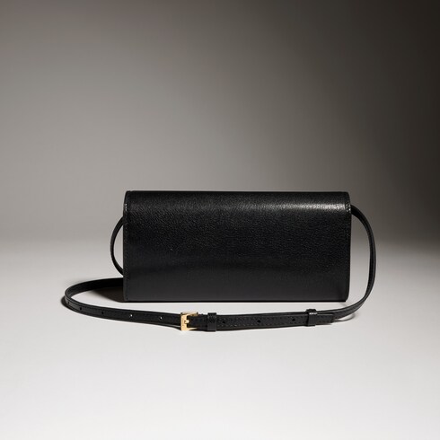 Portefeuille avec sangle et inscription Gucci