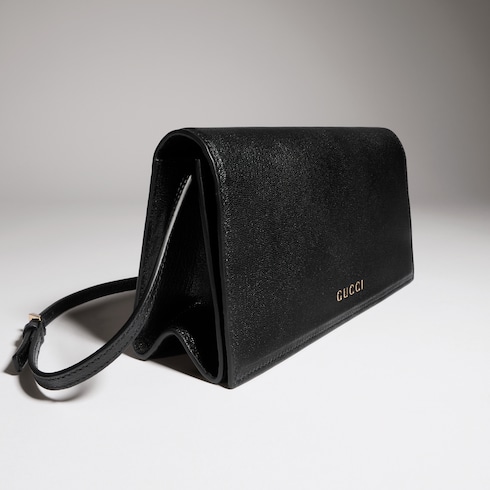 Mini bag with Gucci lettering