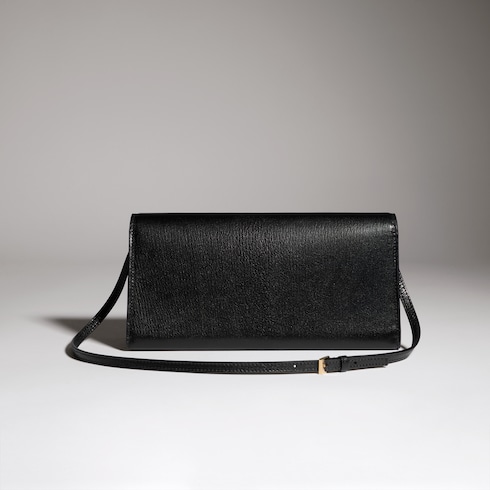 Minibolso con letras Gucci