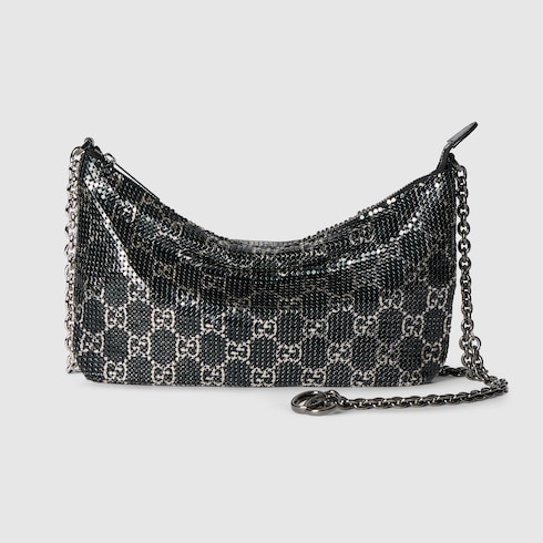 Metallic evening bag with charm