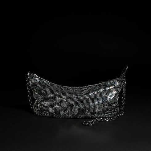 Bolsa de noche metálica con dije