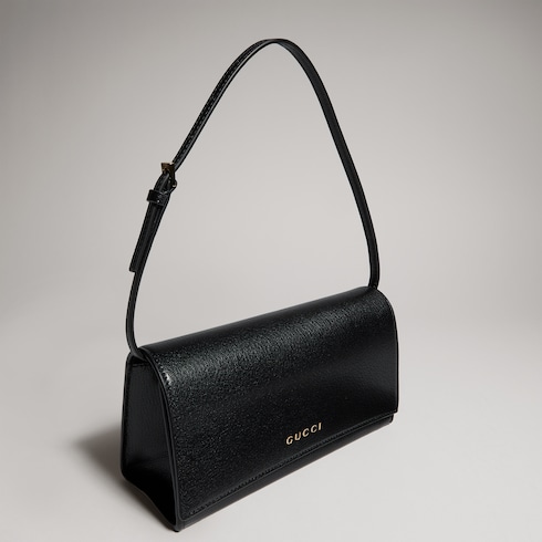 حقيبة داخلية صغيرة مزيّنة بأحرف Gucci