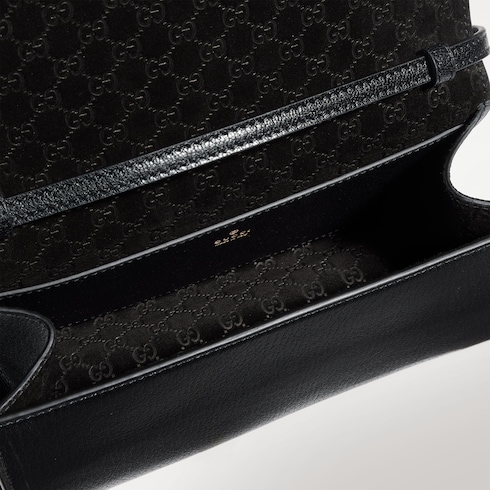 Mini pouch con scritta Gucci
