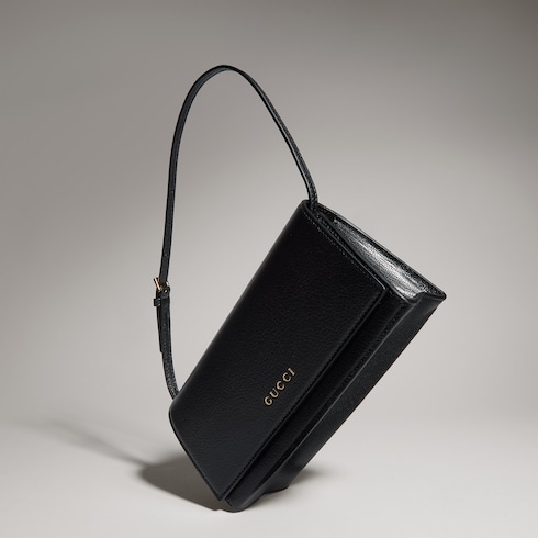 Mini pouch con scritta Gucci