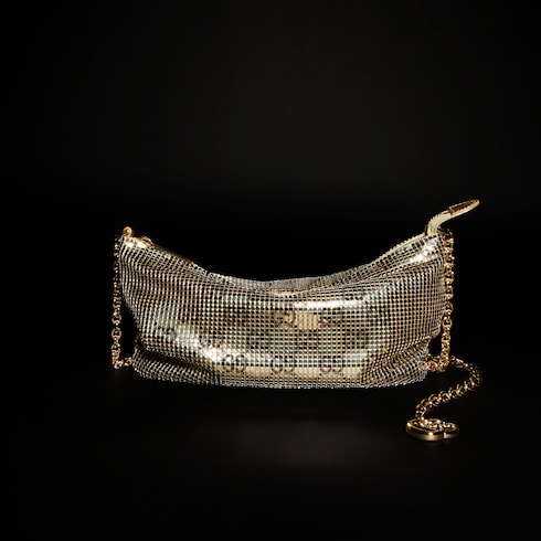 Bolsa de noche metálica con dije