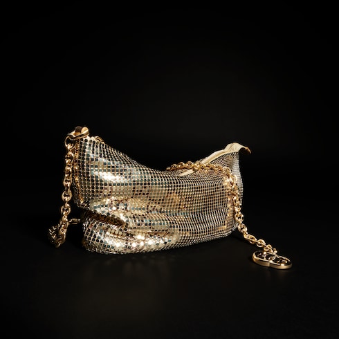 Bolsa de noche metálica con dije