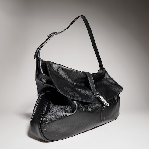 Borsa a tracolla con chiusura a pistone misura grande