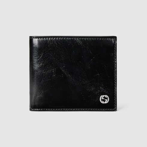 Bi-fold wallet with Interlocking G in black textured leather