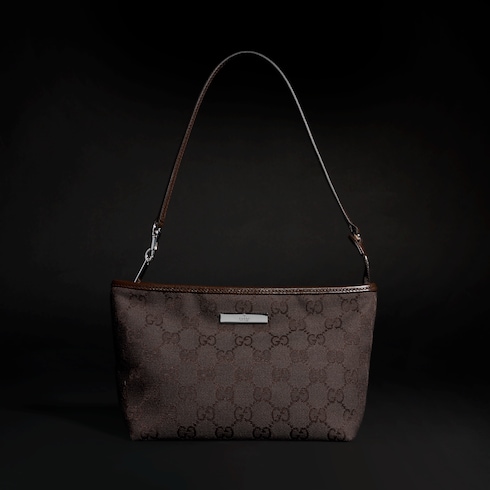 Small pouch with strap and Gucci plaque