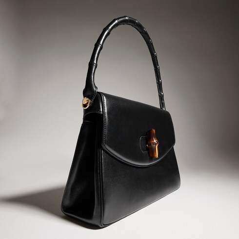 Medium top handle bag with bamboo