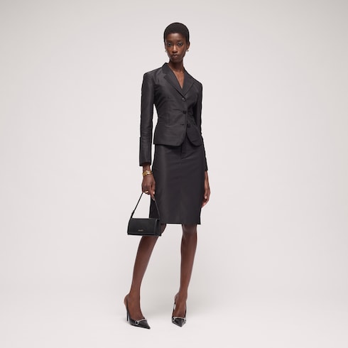 Mini pochette avec lettrage Gucci