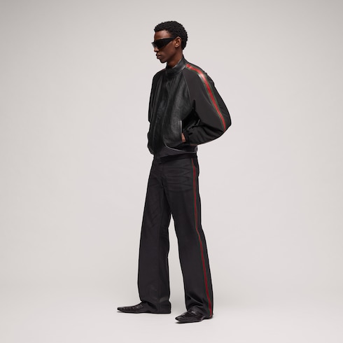 Bomber in pelle martellata con nastro Web