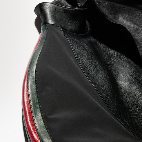 Bomber in pelle martellata con nastro Web