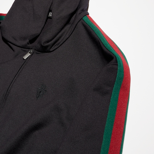 Chaqueta de punto de algodón con cremallera y tribanda Web