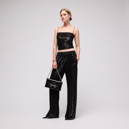 Jersey pants with iridescent effect