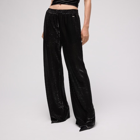 Jersey pants with iridescent effect