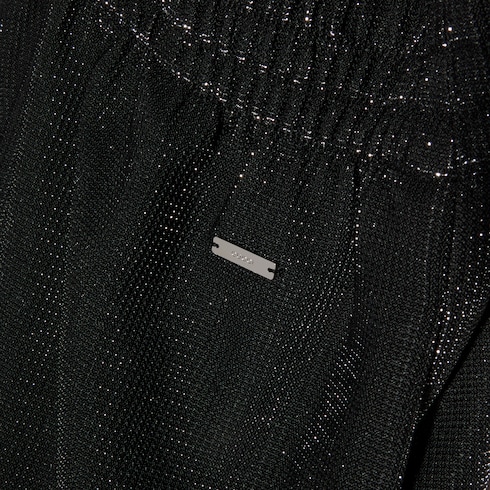 Jersey pants with iridescent effect