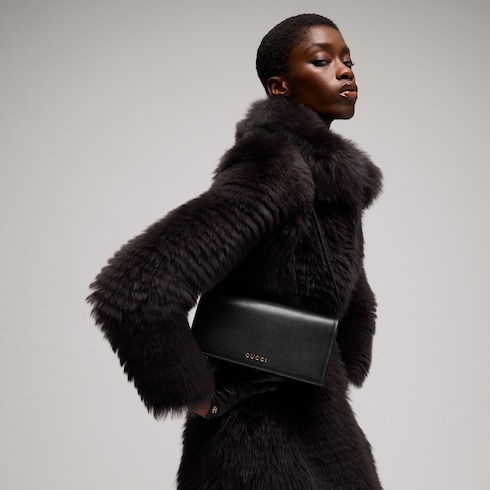 Mini-Tasche mit Gucci Schriftzug