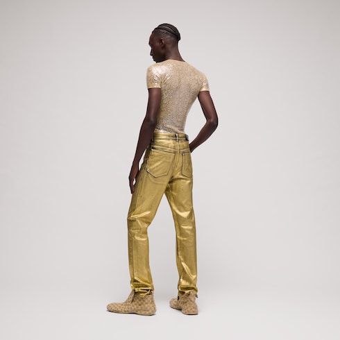 Pantalón ajustado de denim de algodón con revestimiento