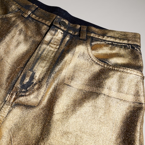 Pantalón ajustado de denim de algodón con revestimiento
