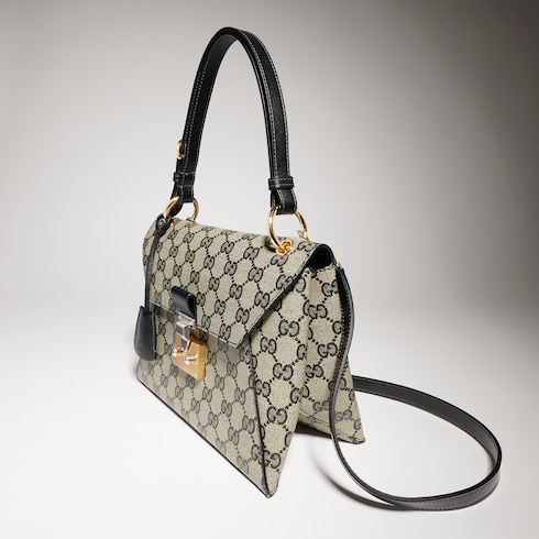Small top handle bag with lock