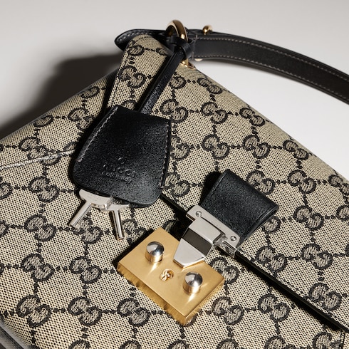 Bolso de mano pequeño con asa y cerradura