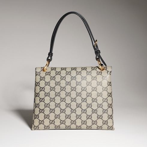 Small top handle bag with lock