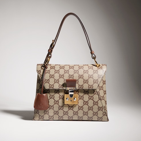 Small top handle bag with lock