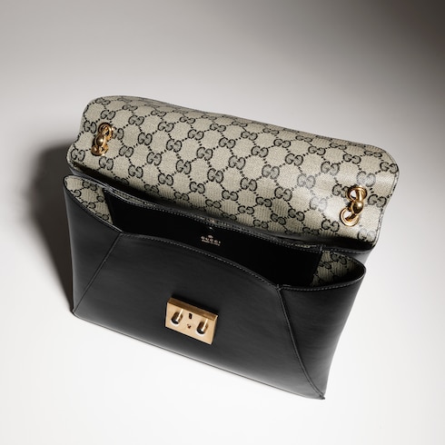 Medium top handle bag with lock