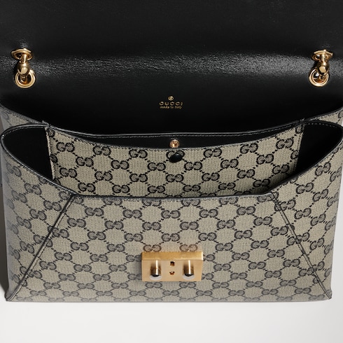 Medium top handle bag with lock