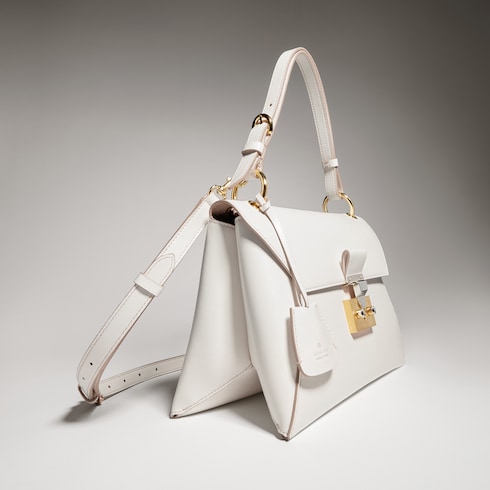 Small top handle bag with lock