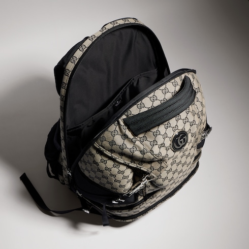 饰推入式锁扣翻盖背包