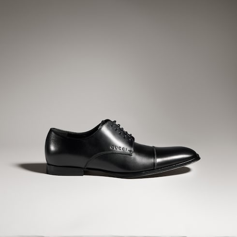 Men's lace-up shoe with embossed logo