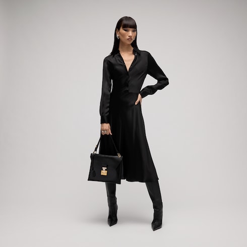 Medium top handle bag with lock