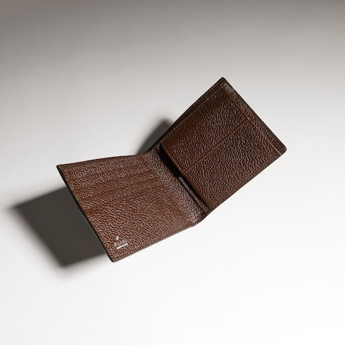 Bi-fold coin wallet with Web
